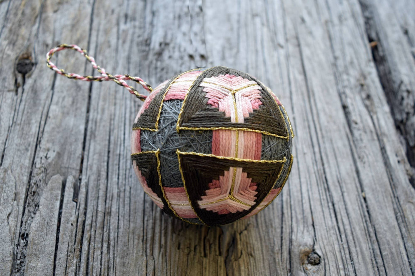 Soft rose temari ball with brown triangles on grey base