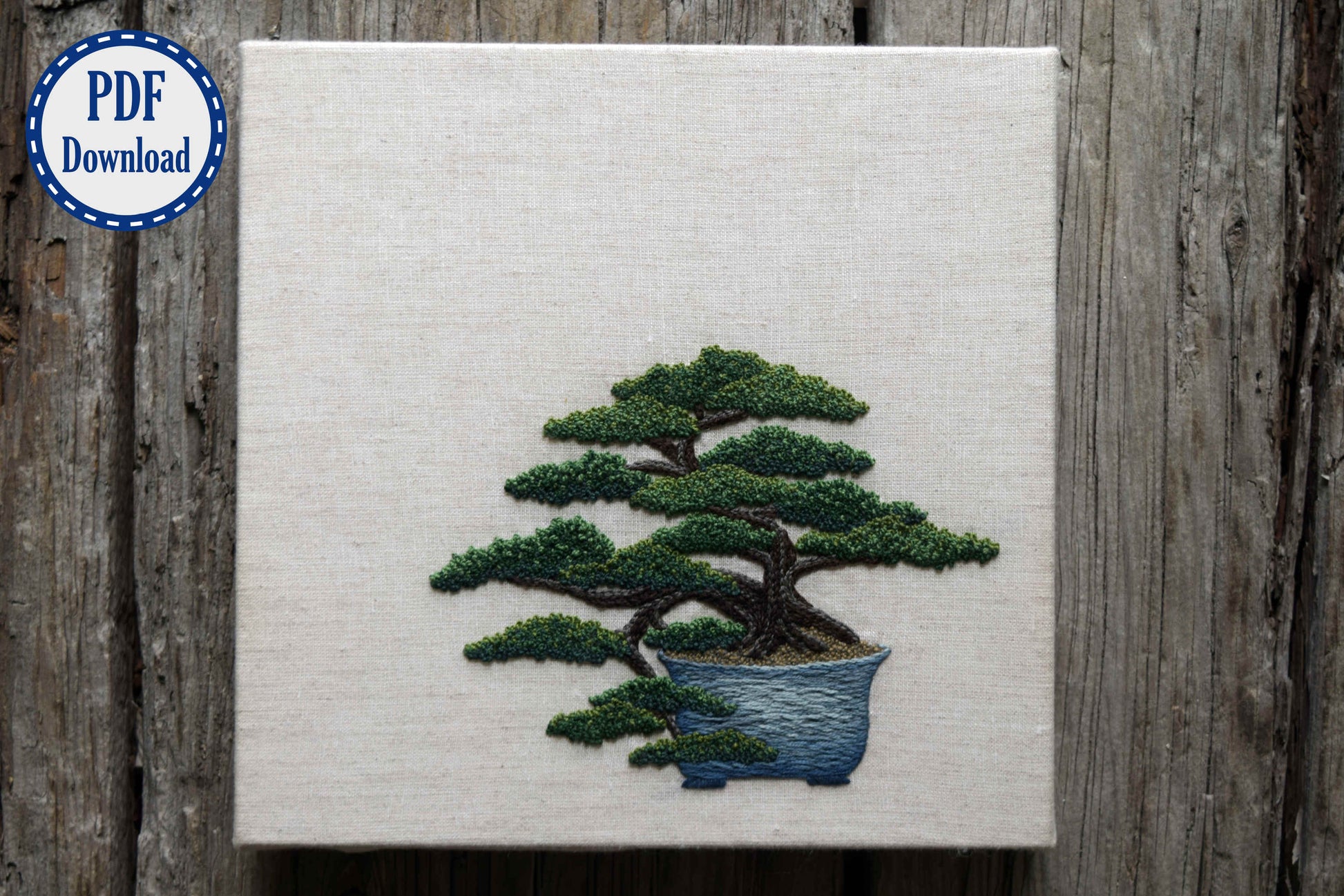 Japanese bonsai tree embroidery pattern. PDF download badge in corner.