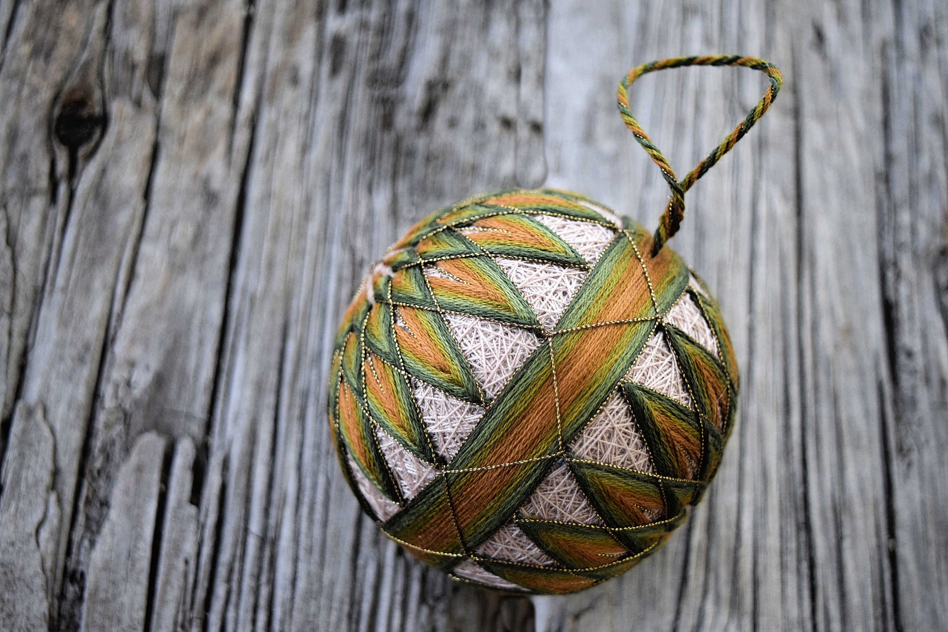 Hand embroidered Japanese temari ball with kiku design and obi band