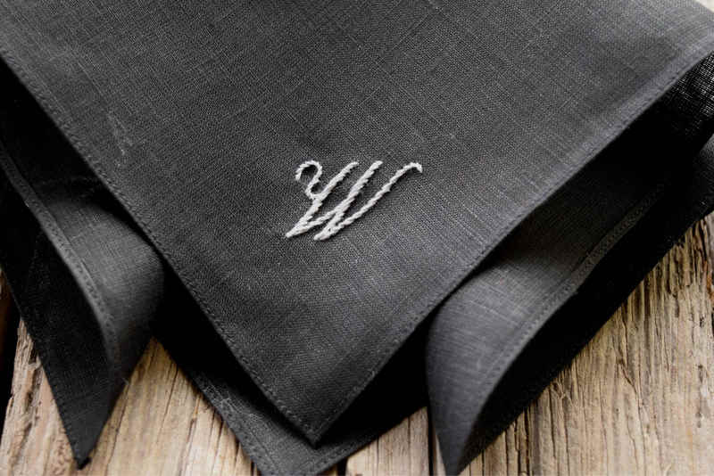 Irish linen pocket square in black with grey letter W hand embroidered in one corner
