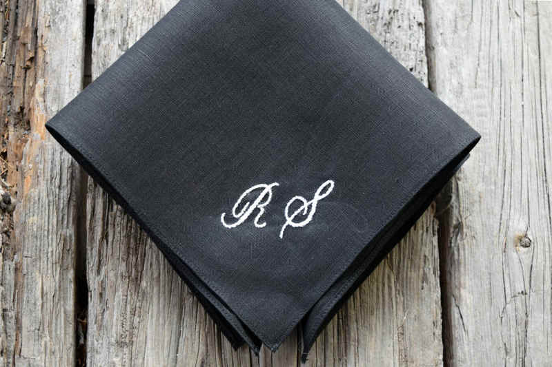 Black linen pocket square with RS in white cursive script
