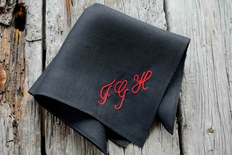 Black linen hankie showing hand embroidered letters FGH in red