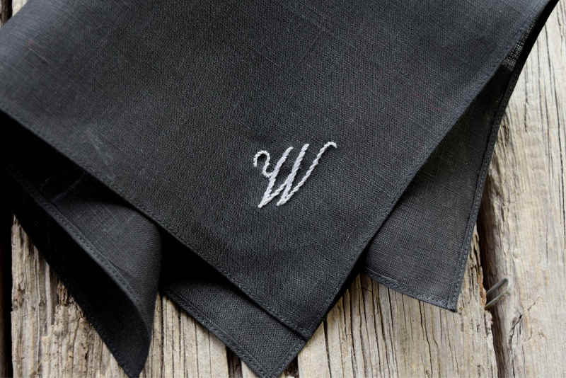 Black linen pocket square with grey letter W hand embroidered in one corner