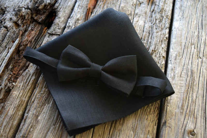 Side view of black Irish linen bow tie and pocket square