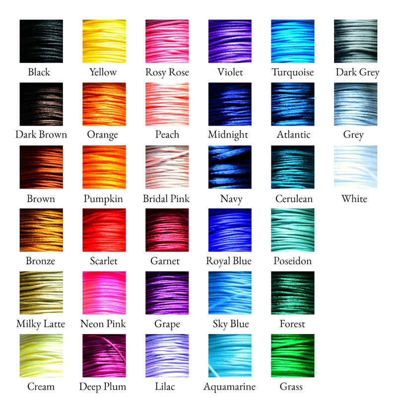 Color card of satin cords. Colors, in columns down from left, read: Black, Dark Brown, Brown, Bronze, Milky Latte, Cream, Yellow, Orange, Pumpkin, Scarlet, Neon Pink, Deep Plum, Rosy Rose, Peach, Bridal Pink, Garnet, Grape, Lilac, Violet, Midnight, Navy, Royal Blue, Sky Blue, Aquamarine, Turquoise, Atlantic, Cerulean, Poseidon, Forest, Grass, Dark Grey, Grey, White