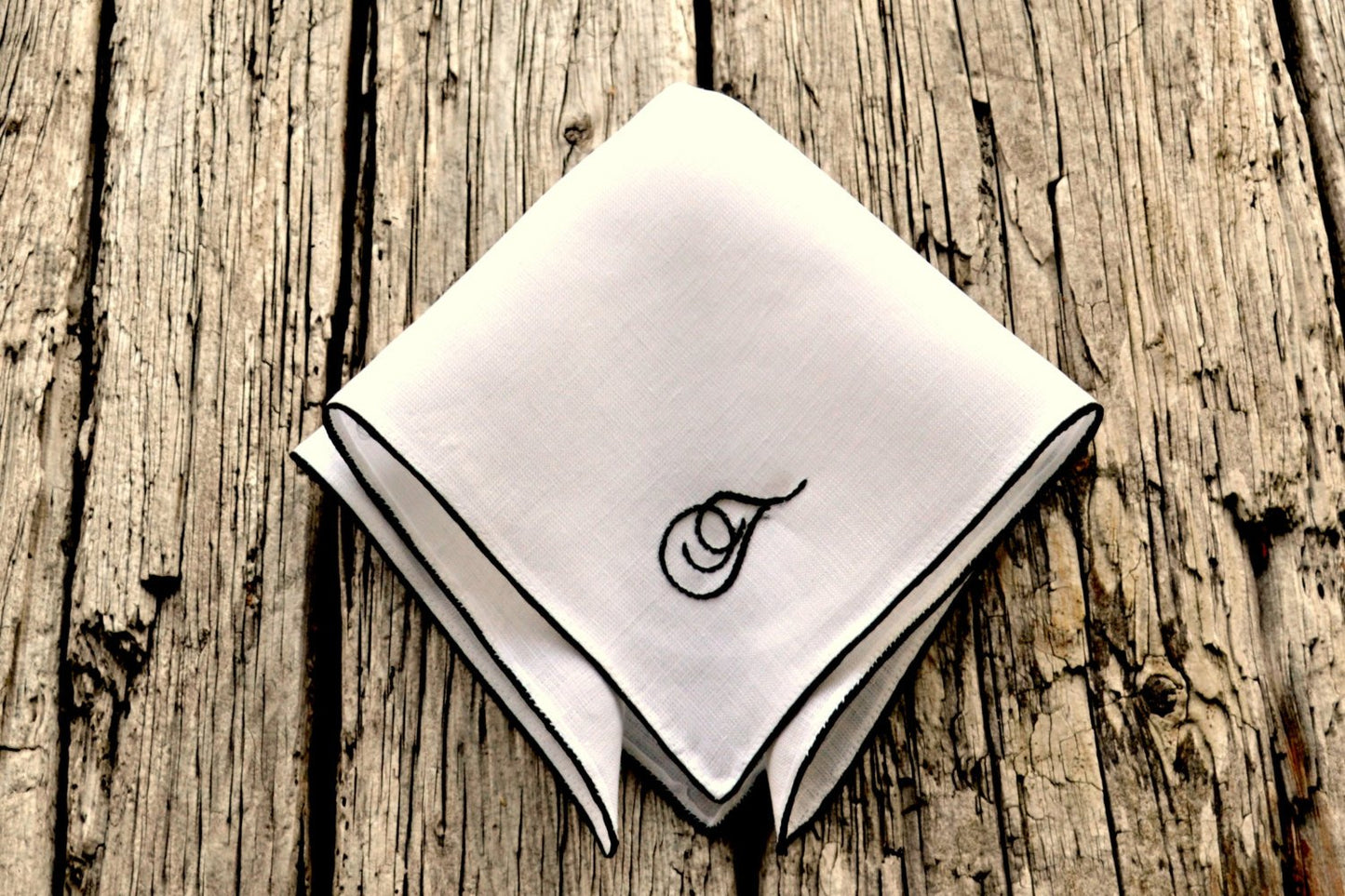 Irish linen pocket square with black border and monogram
