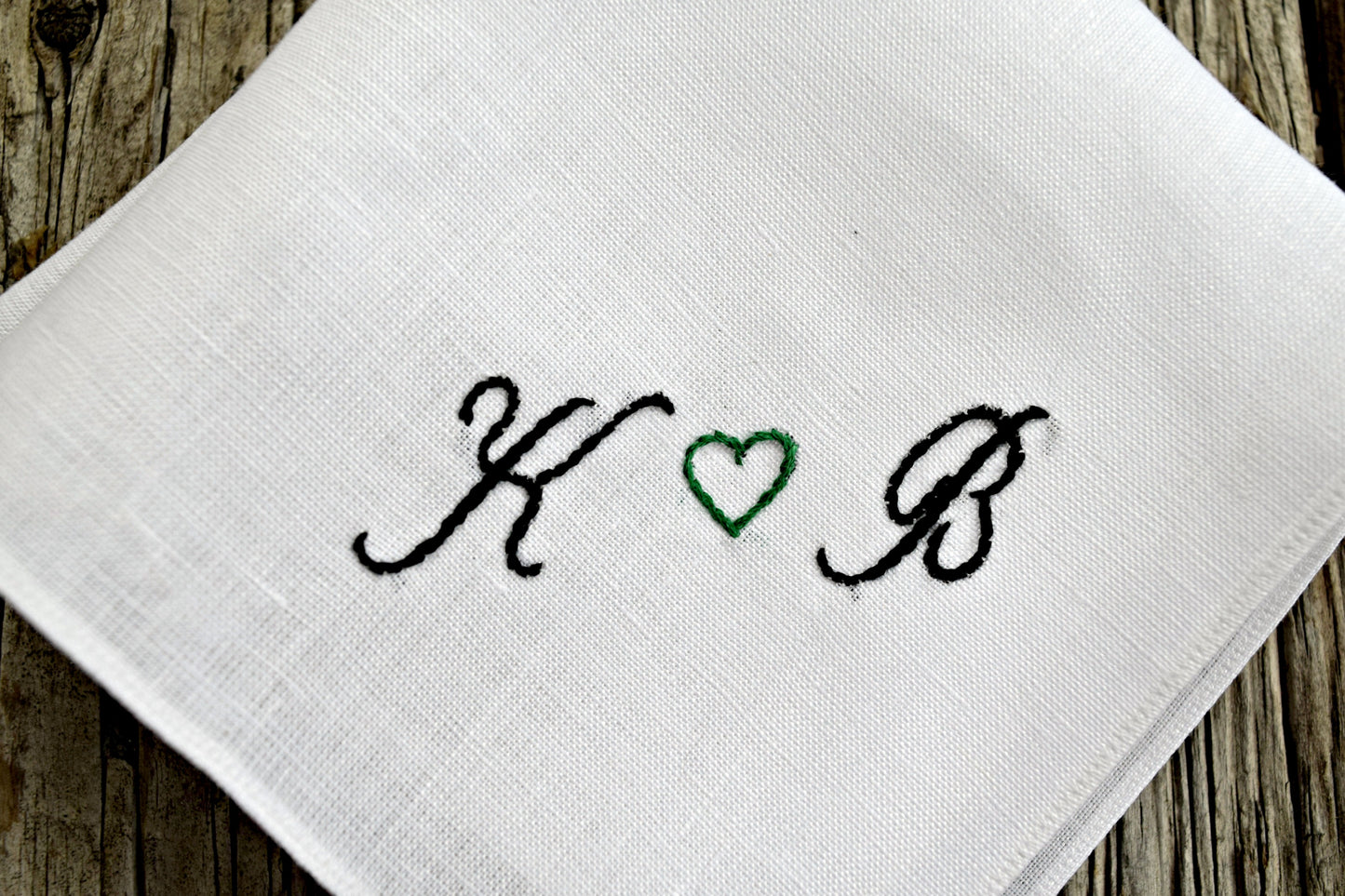 Sweetheart handkerchief embroidered with two initials and heart in black and green