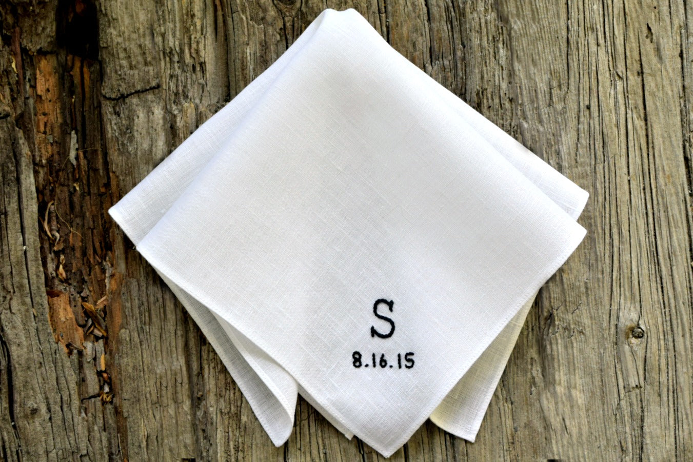 White linen pocket square hand embroidered with monogram initial and wedding date