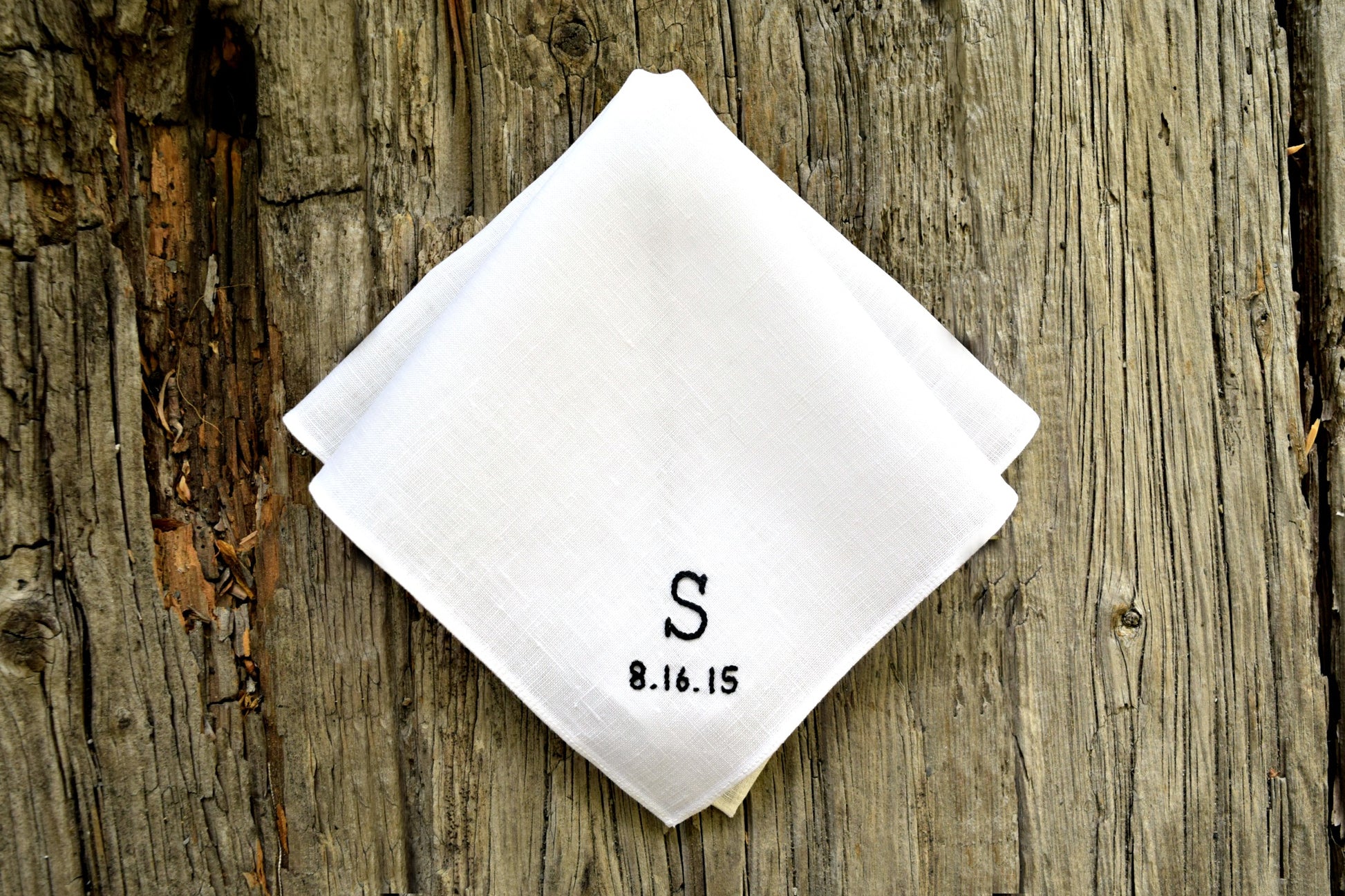 White linen pocket square with personalized initial and wedding date